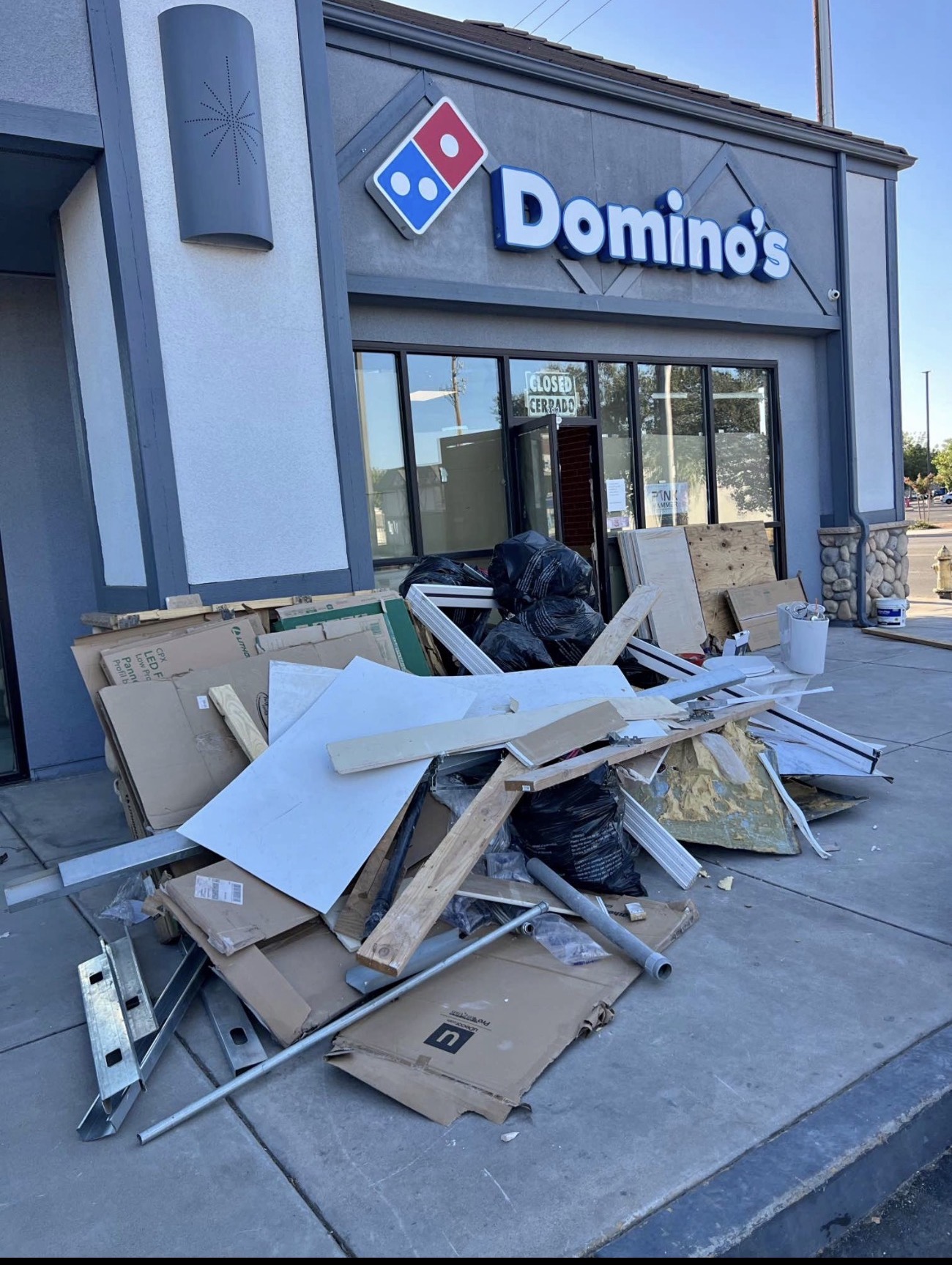 Commercial storefront debris removal in Sacramento before and after before