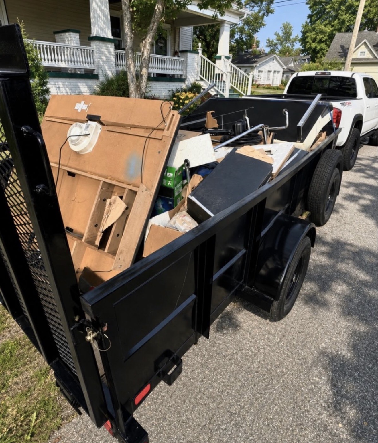 Dump trailer full of construction and household debris